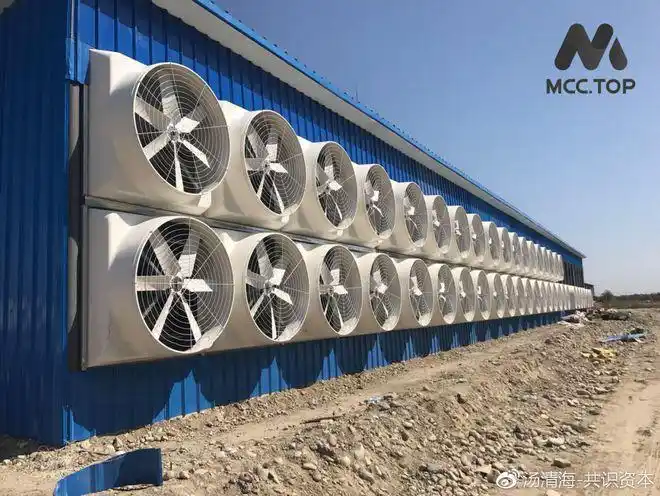 A large mining farm with rows of mining rigs and cooling systems.